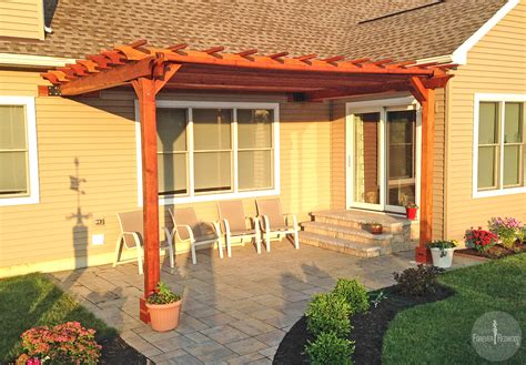 how to attach pergola to house roof